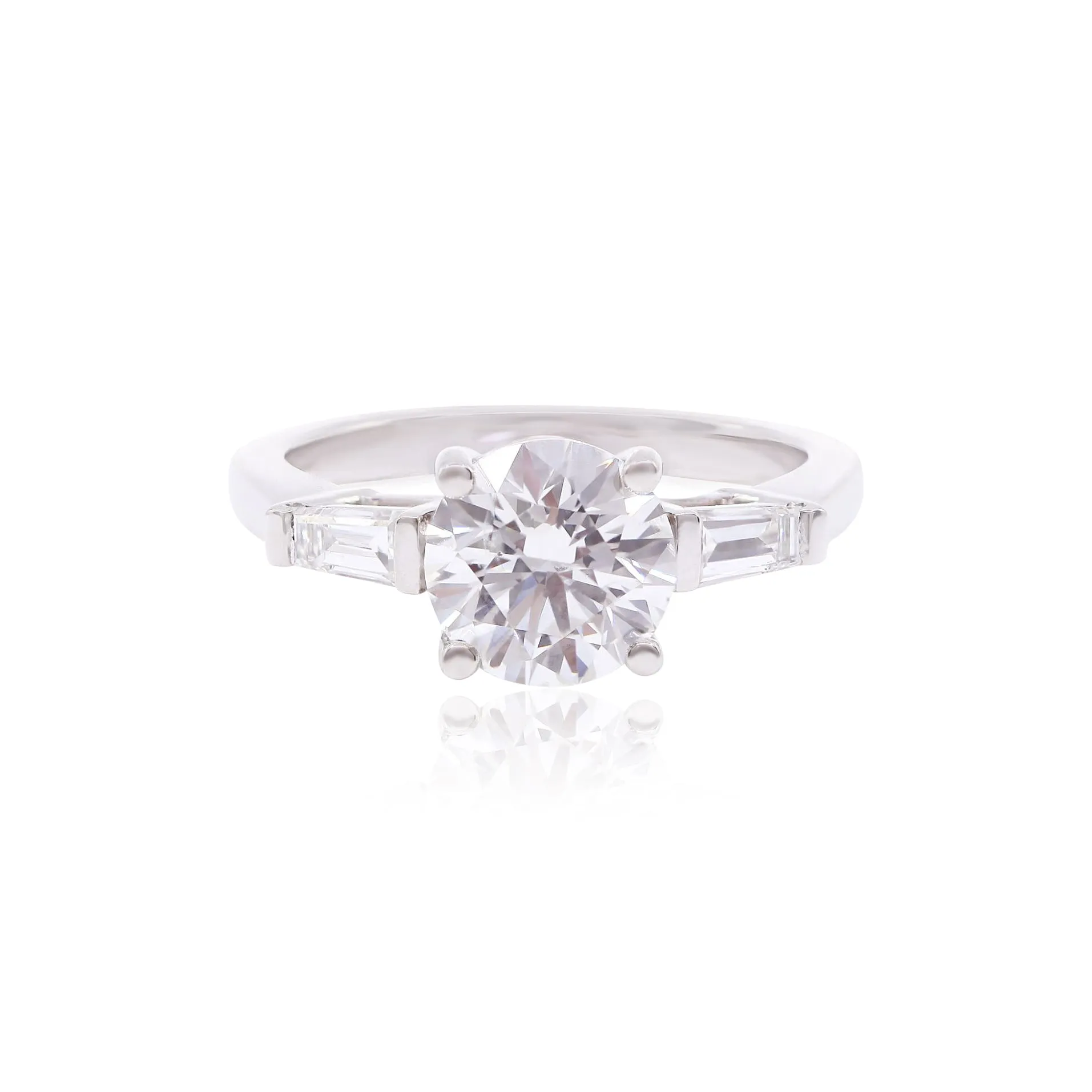 PLATINUM 2.00CT ROUND BRILLIANT CUT AND TAPERED BAGUETTE THREE-STONE ENGAGEMENT RING