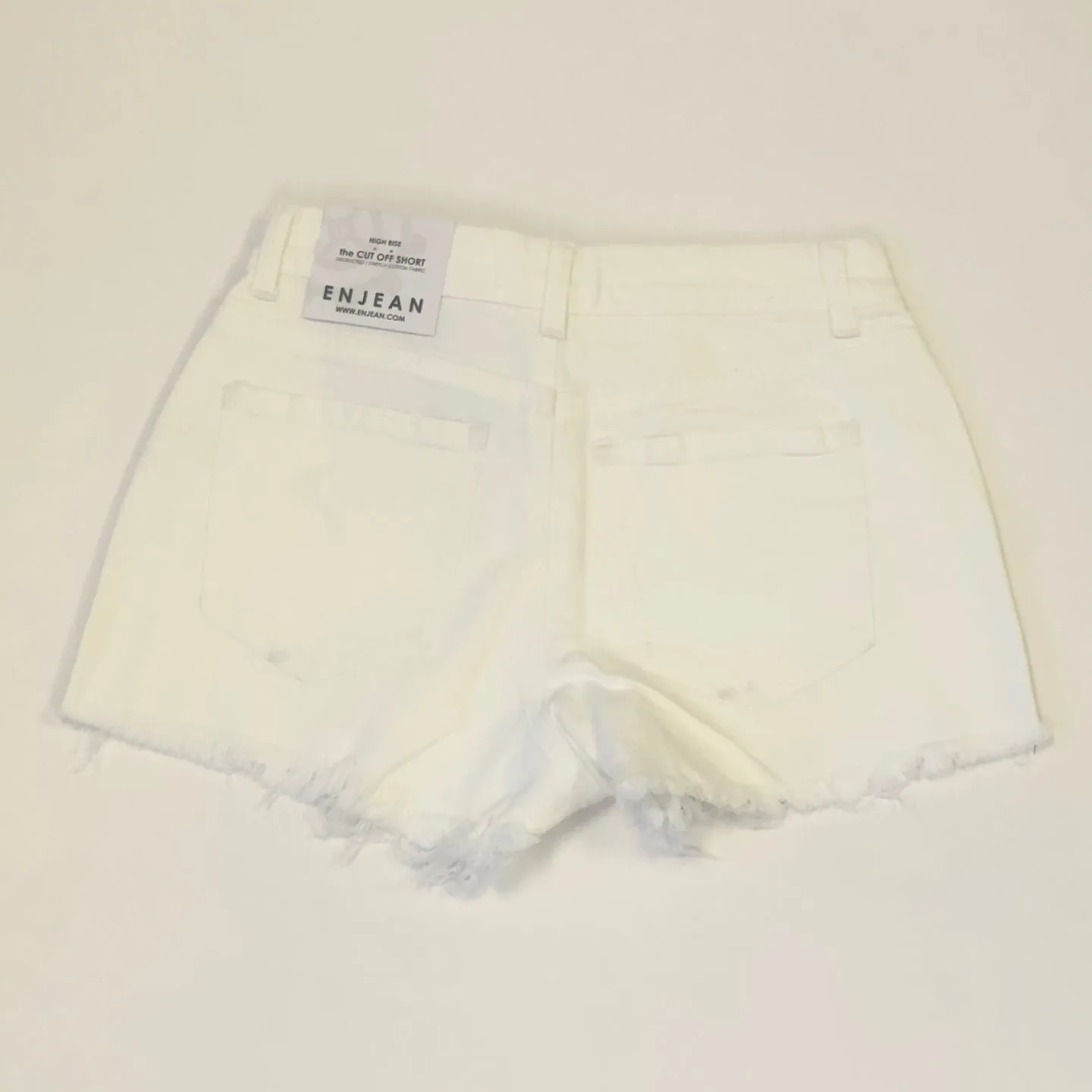 Woman's Highrise Destructed Denim Short